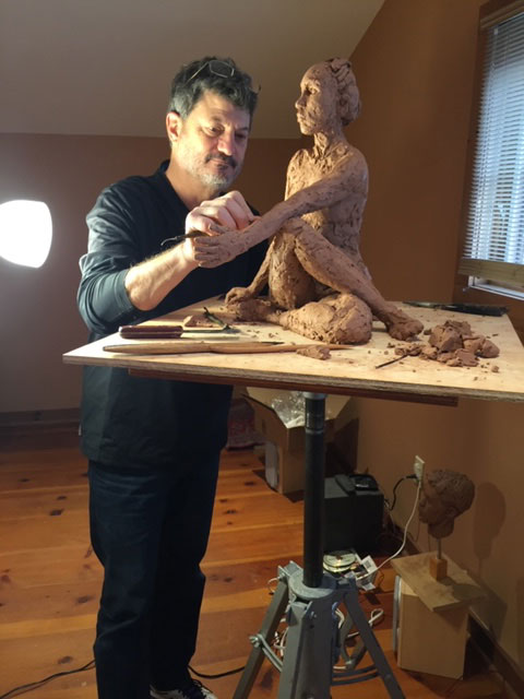 William Casper sculpting clay figure